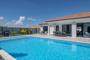 Maison recente de plain-pied avec piscine a La Plaine sur Mer